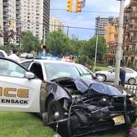 Police Officer, SUV Passengers Hospitalized After Crash