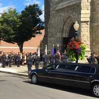 <p>An honor guard stands outside St. Peter&#x27;s Church during the funeral Mass for Danbury Police Sgt. Drew Carlson.</p>