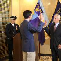 <p>New Rochelle Police Commissioner Joseph Schaller being sworn in.</p>