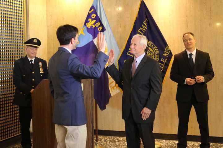 New Rochelle Police Commissioner Joseph Schaller being sworn in.