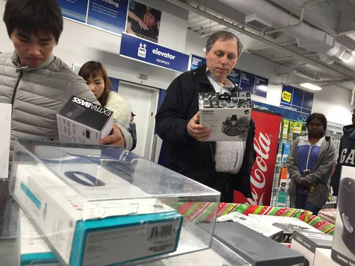 Black Friday shoppers check out doorbuster deals at Best Buy in Paramus.