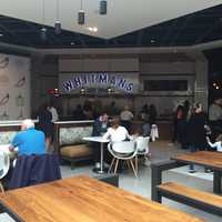 <p>Diners lined up the new Whitmans at Savor Westchester in White Plains. This is eatery&#x27;s first location outside of Manhattan.</p>