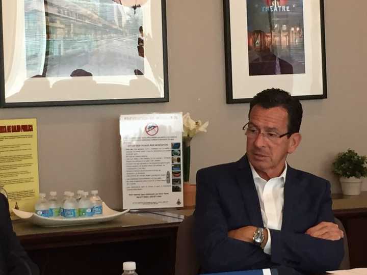 Gov. Dannel Malloy listens to a roundtable panel on Zika preparedness at the Stamford Government Center Wednesday.