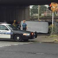 <p>Police have blocked the road at the scene of a van rollover accident near downtown Stamford.</p>