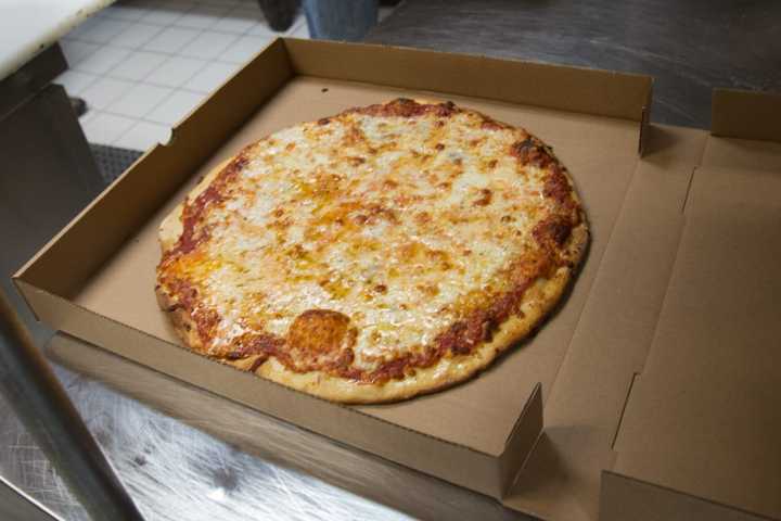 The finished product: A record-setting 109 cheese pizza.