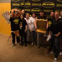 <p>The crew from 95.9 The Fox with the 109 cheese pizza.  L to R: Stephanie Webster, Matt Nuzzo, Todd and Monica Brown, Dennis Letizia and Erik Ofgang.</p>