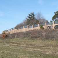 <p>Defaced sound barriers on the highway.</p>