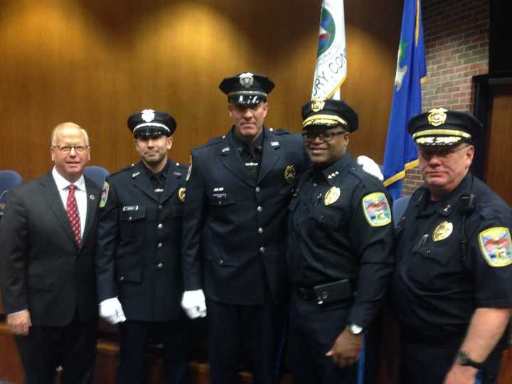 From left: Mayor Mark D. Boughton, Detective John Rudisill, Detective Robert Perun, Chief Patrick A. Ridenhour and Deputy Chief Shaun J. McColgan at Tuesday&#x27;s swearing-in ceremony.