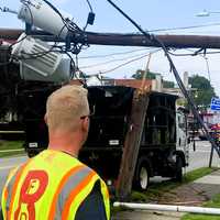 Power Knocked Out, Road Temporarily Closed When Contractor's Truck Downs Pole In Ridgewood