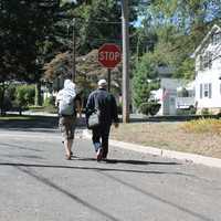 <p>Pedestrians walk toward Phelps Avenue and Knickerbocker Road. </p>