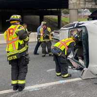 Trapped Driver Freed By Firefighters After SUV Rolls Onto Route 17