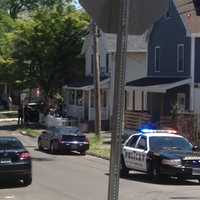 <p>Police investigate a shooting Sunday on Kossuth Street in Norwalk.</p>