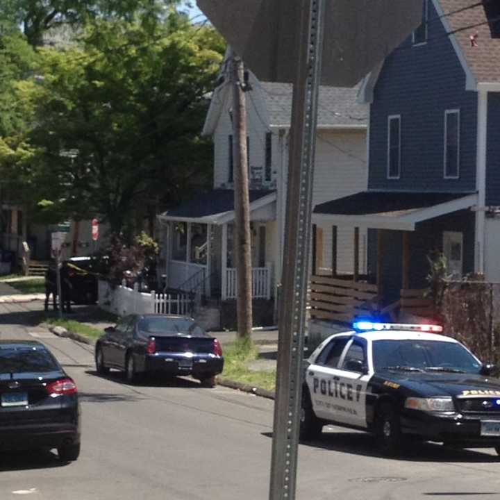 Police investigate a shooting Sunday on Kossuth Street in Norwalk.