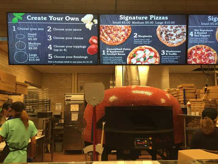 The pizza shop at Wegmans Food Market where you can make your own.