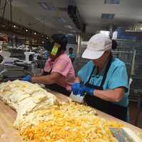 <p>Making the cheese bread at the new Wegmans in Montvale.</p>