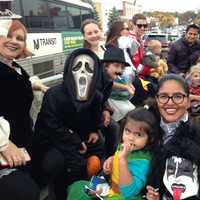 <p>Costume-clad residents gear up for a ride around Memorial Park in Van Neste Square.</p>