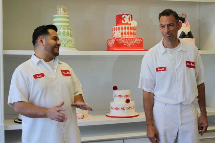 Cake decorator Omar Lopez with Dwight Miller in the expanded shop. 