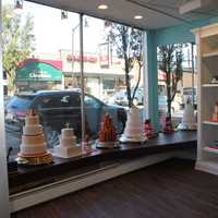 <p>Model cakes in the store window of Miller&#x27;s Bakery on Anderson Avenue in Cliffside Park. </p>