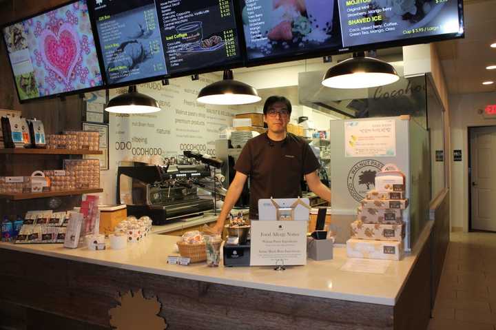 Ryan Moon, a business owner, stands in his shop on Closter Dock Road. 