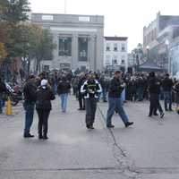 <p>Bikers and attendees stroll Chestnut Street at the Ridgewood 10th Annual Fall Motorcycle Classic</p>