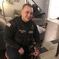 <p>Bogota Police Officer Jon Gallipoli and Tucker</p>