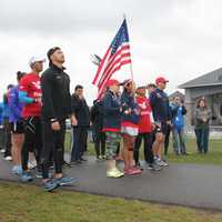 <p>Runners and Walkers line up at the start of the TRACERS event. </p>