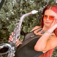 Redheaded TikTok Saxophonist Is Taking New Jersey Nightlife By Storm