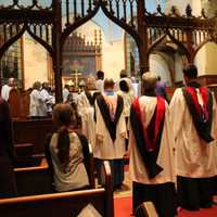 <p>Members of the choir prepare to sing at the Vespers Vigil of the Commemoration of All Faithful Departed mass and concert. </p>