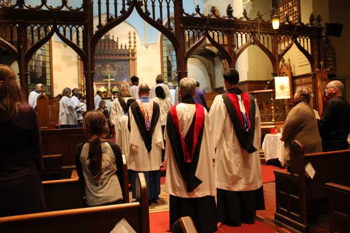 Members of the choir prepare to sing at the Vespers Vigil of the Commemoration of All Faithful Departed mass and concert. 