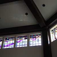 <p>Colorful windows replace the once plain glass in the daily chapel at Closter&#x27;s Emanu-el Temple. </p>