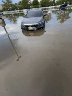 Submerged Car Leaves Delivery Driver Stranded