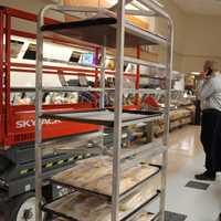 <p>Crews unload stock in advance of Friday's Opening Day. </p>