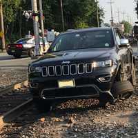 <p>The Jeep ended up on the railroad right-of-way next to the tracks.</p>