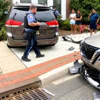 <p>The Toyota minivan got knocked onto the sidewalk and nearly slammed into an office building on East Ridgewood Avenue at the corner of North Maple Avenue in Ridgewood shortly before 11:30 a.m. Thursday, Aug. 24.</p>