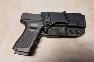 Man Accused Of Threatening Officer With Fake Glock In Area