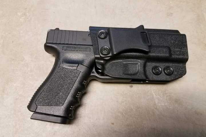 Man Accused Of Threatening Officer With Fake Glock In Area