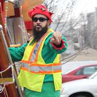 <p>Volunteer elves traveled around Cliffside Park with Santa. </p>