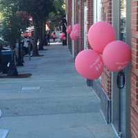 <p>Pink balloons line the storefronts Thursday for the Go For Pink even in Greenwich.</p>