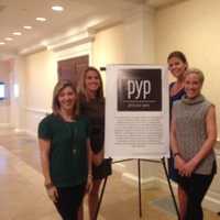 <p>The four founders of Pitch Your Peers, from left, Rachel LeMasters, Dara Johnson, Brooke Bohnsack and Nina Lindia, welcome members to Pitch Night at First Presbyterian Church in Greenwich.</p>