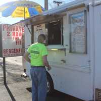 <p>A regular customer waits for his hotdog order in Bergenfield at Mark&#x27;s Hot Dogs. </p>