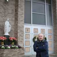 <p>Rev. Charles Granstand welcomes parishoners to get closer to the faith at the Park Ridge church where he serves. </p>