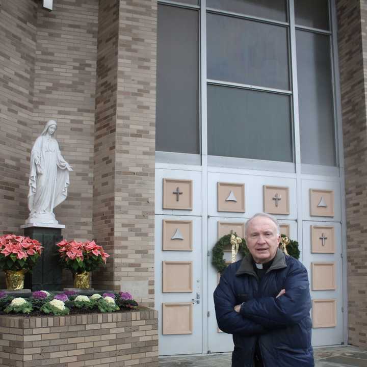 Rev. Charles Granstand welcomes parishoners to get closer to the faith at the Park Ridge church where he serves. 