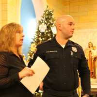 <p>Linda Petruzzello and her son&#x27;s partner, Thaier (Theo) Abdallah, address congregants.</p>