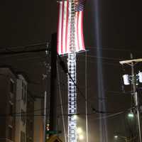 <p>Ron Petruzzello got the necessary approvals for search lights to illuminate the Stars and Stripes.</p>