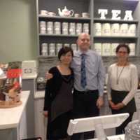 <p>Shu-Chuan Chen and Alex Higle, owners of Culture Tea, and Wendy Fellows, an employee, stand behind the counter at the tea room in Wilton Center.</p>