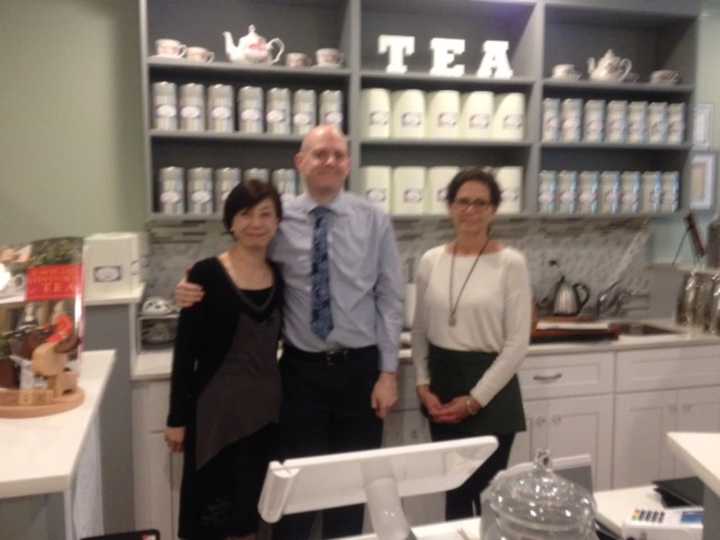 Shu-Chuan Chen and Alex Higle, owners of Culture Tea, and Wendy Fellows, an employee, stand behind the counter at the tea room in Wilton Center.