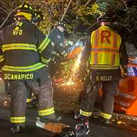 <p>Ridgewood firefighters sliced a section of guardrail with a power saw to free the Mustang.</p>