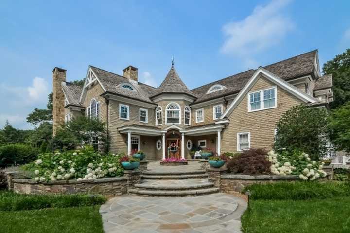 The Ridgewood mansion at 150 Brookside Drive will be auctioned to the highest bidder without reserve, the Wall Street Journal reported.