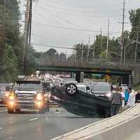 Driver Climbs Out After Rollover During Multi-Vehicle Crash On Route 208