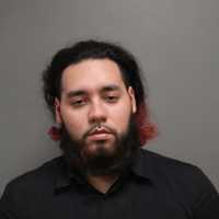 Suffolk Teen Arrested For Spray Painting Large Swastika On Stop Sign, Police Say